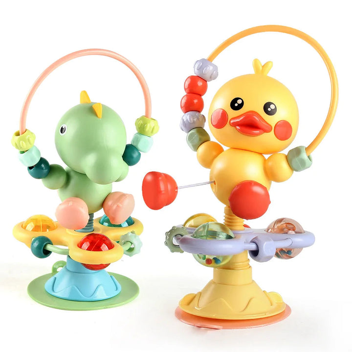 Green dinosaur and yellow duck rattles with bead loops and suction cup bases