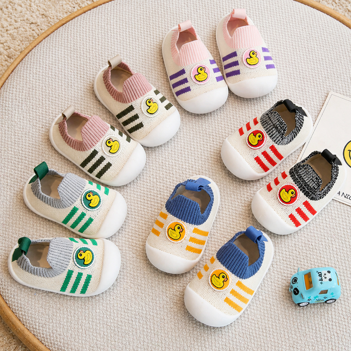 Duck-detail sock shoes displayed in five cuff and stripe color combinations.