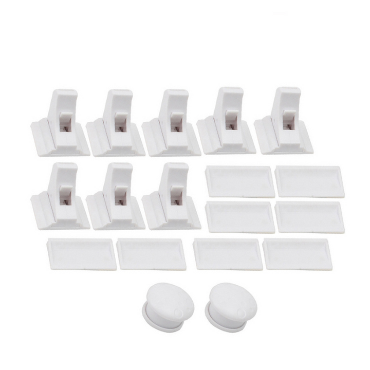 Eight white cabinet locks with matching mounting plates and two magnetic keys