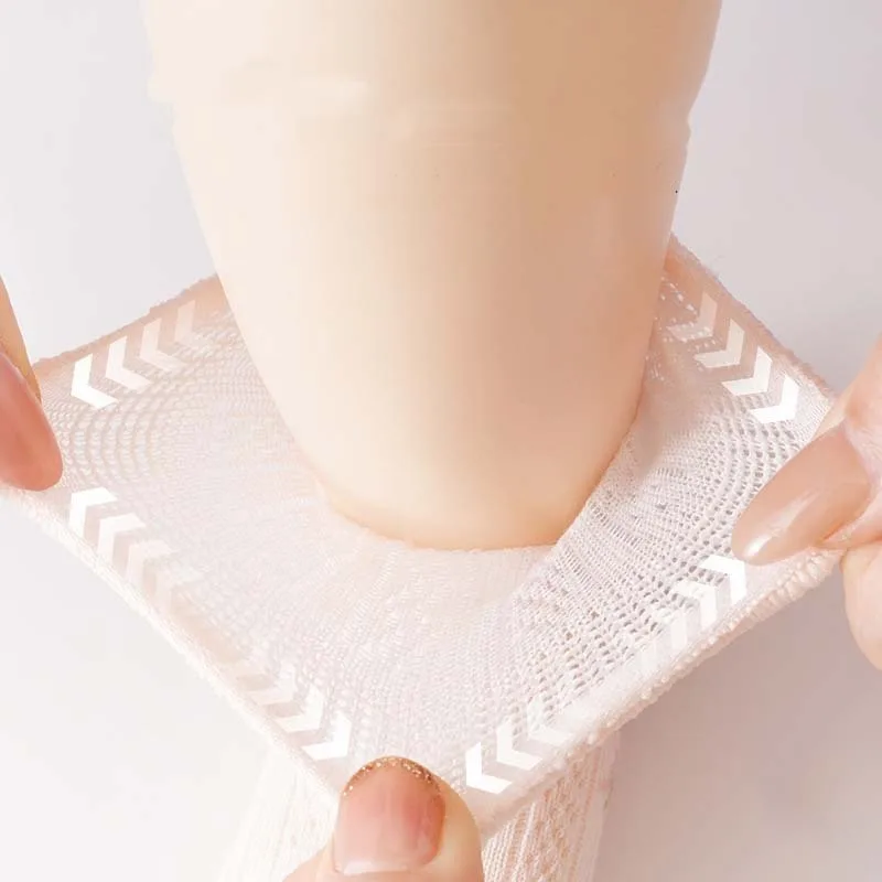 Sock cuff being stretched around a child&