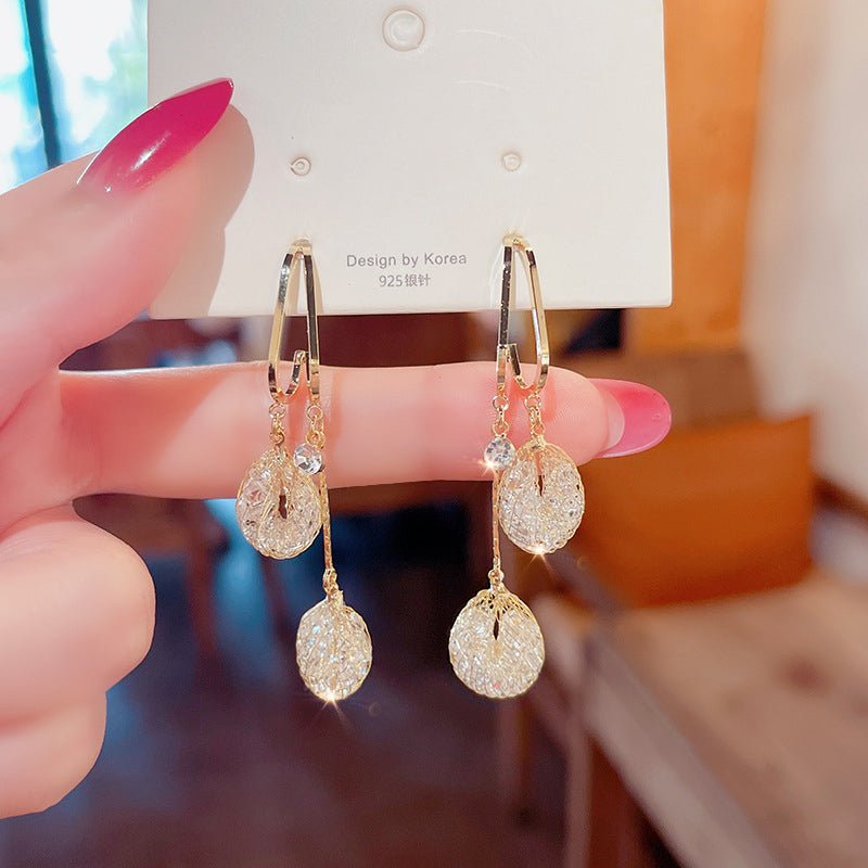 Evara Gold Crystal Tassel Drop Earrings Product Image 01