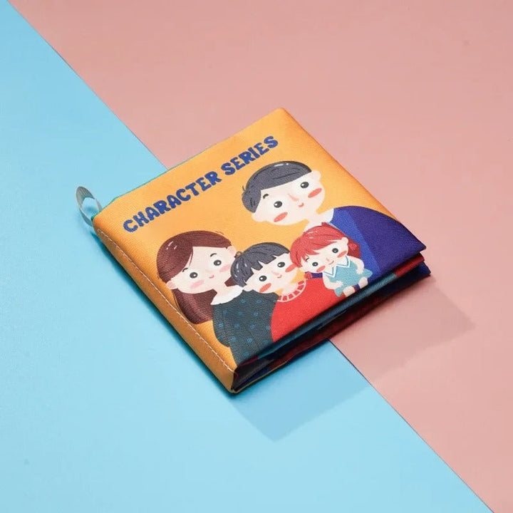 Family-themed cloth book with illustrated people on its yellow cover