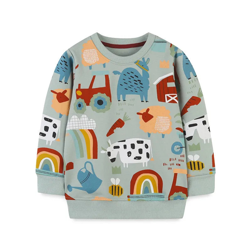 Front of a blue-green sweatshirt with farm animals, tractors, barns, and rainbows