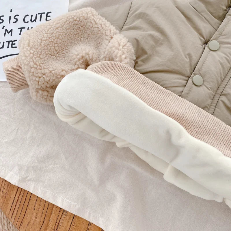 Jacket hem lifted to show the smooth cream lining beneath the beige fleece outer layer