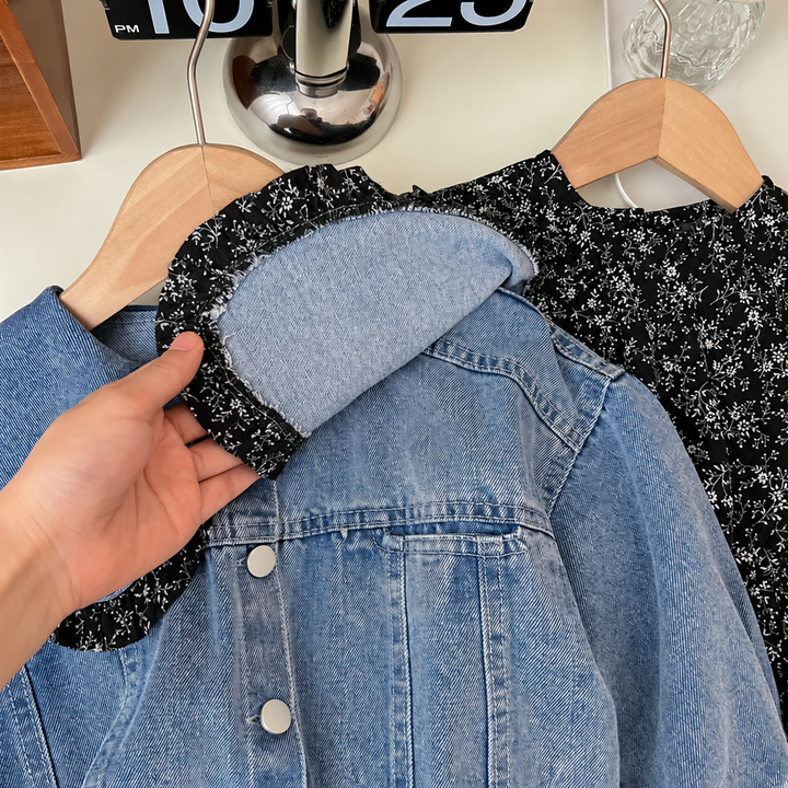 Close-up of the blue denim jacket collar with contrasting black floral ruffle trim