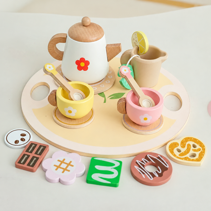 Flower-pattern wooden tea set with pink and yellow cups, a serving tray, and pretend treats