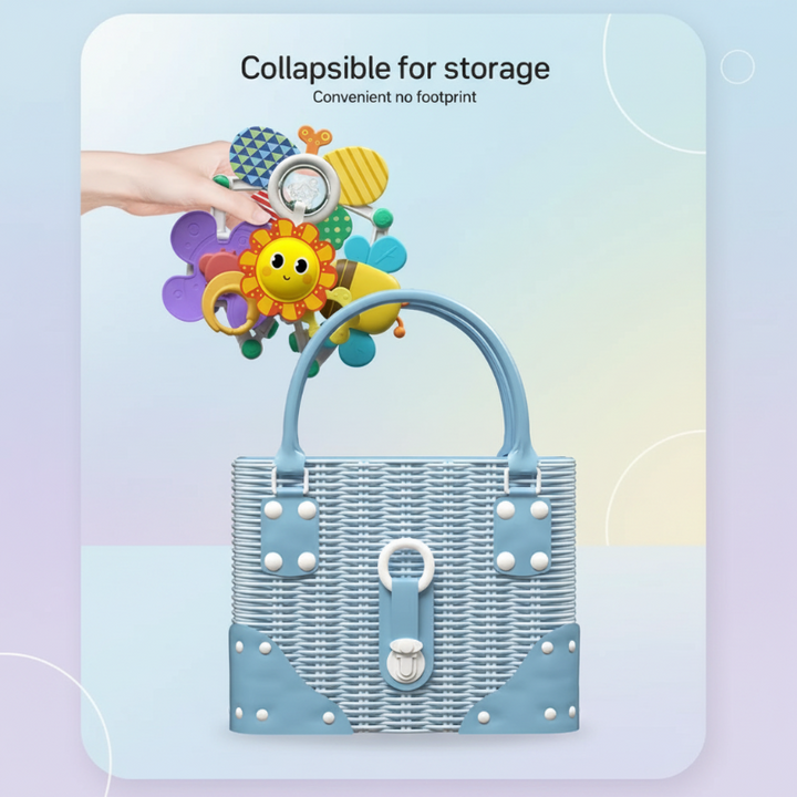 Folded baby play arch held above a handbag to show compact storage