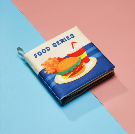 Food-themed cloth book with a burger, fries and drink on the cover