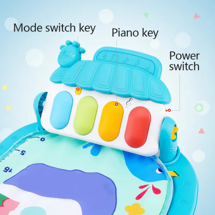 Four colorful piano keys with labeled mode and power controls on a blue baby play gym