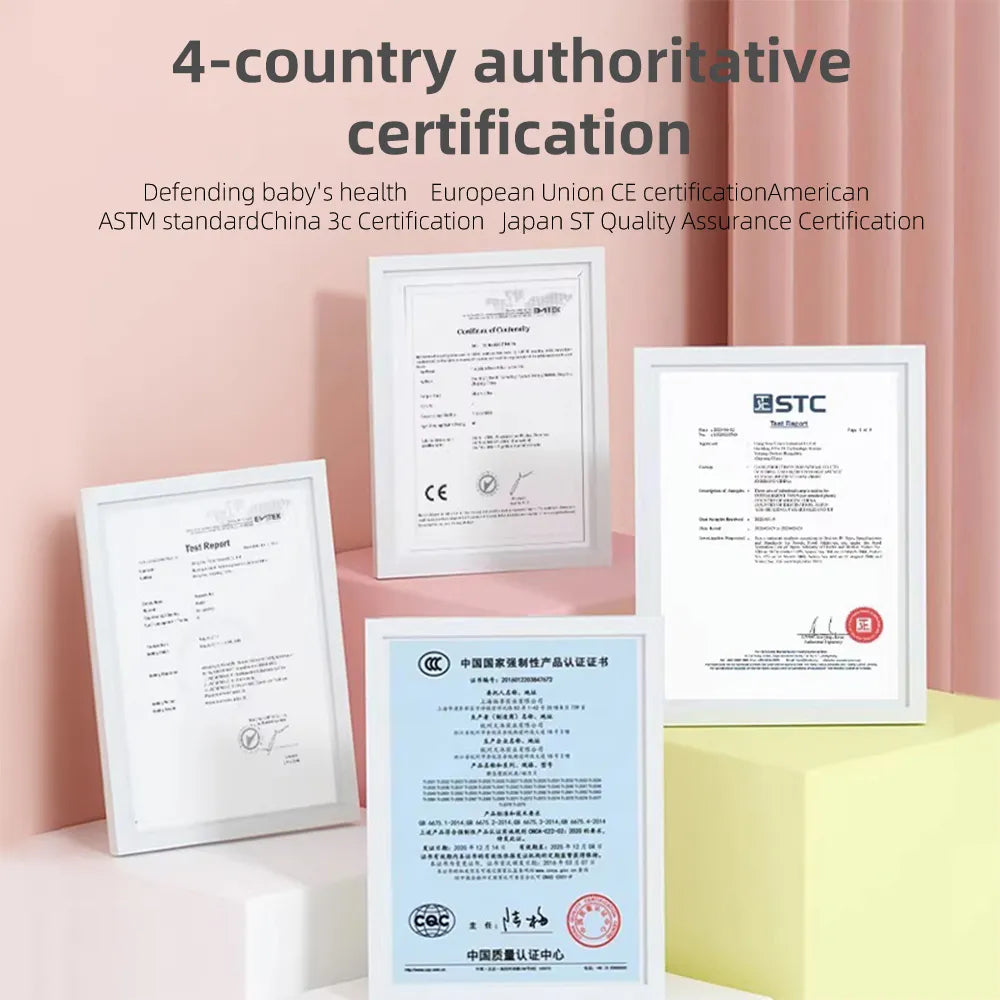Framed documents arranged on white display stands against a pink background