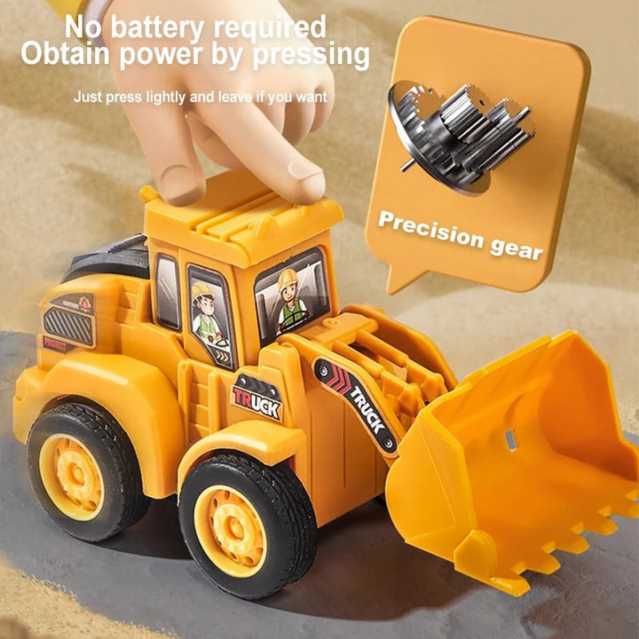 Hand pressing a yellow toy loader&