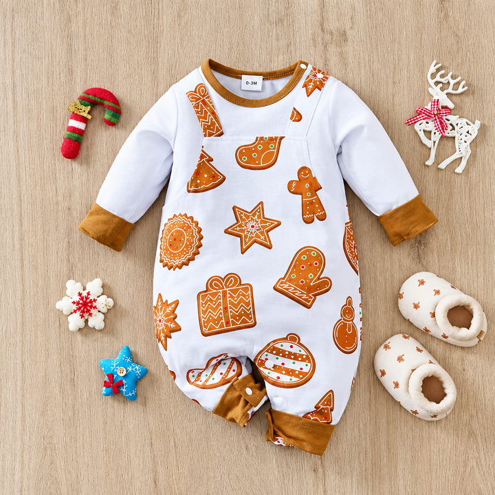 White baby romper with gingerbread, cookie, and candy prints plus brown cuffs