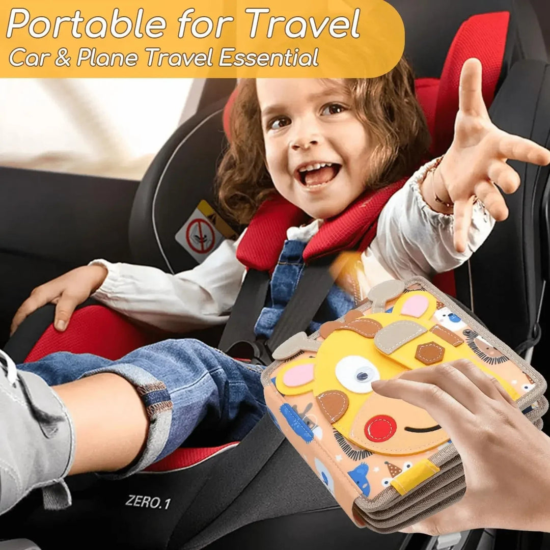 Giraffe-cover felt activity book on a child&