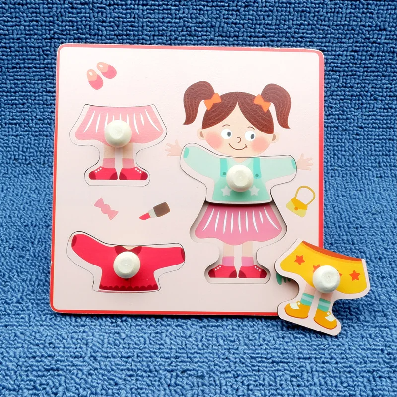 Girl dress-up wooden peg puzzle with colorful clothing pieces