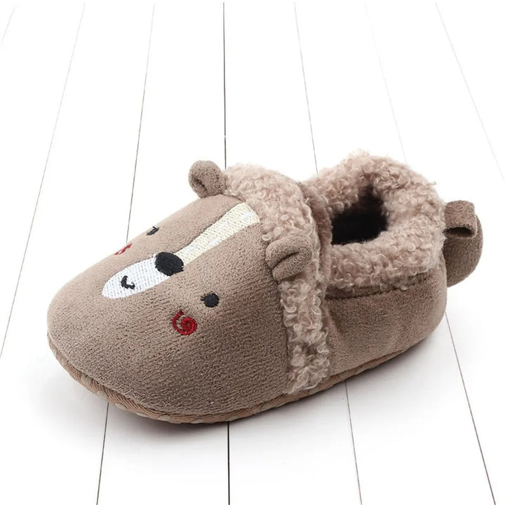Gray bear baby slipper showing its fuzzy opening and heel loop.