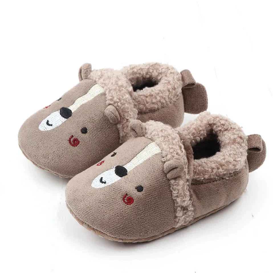 Gray bear baby slippers with fuzzy cuffs and heel pull loops.