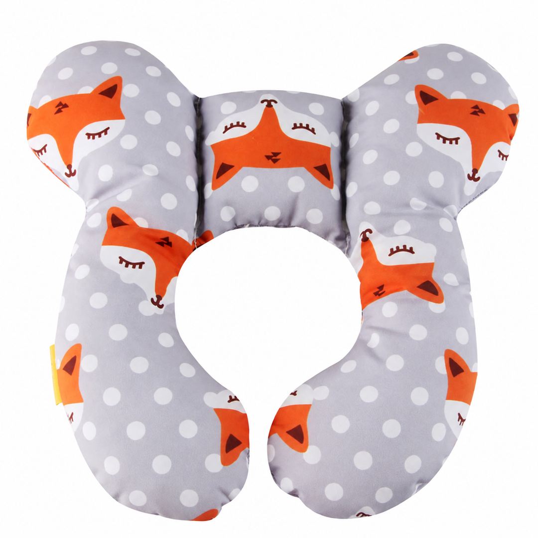 Front view of a gray pillow with orange foxes, white dots, and an open center