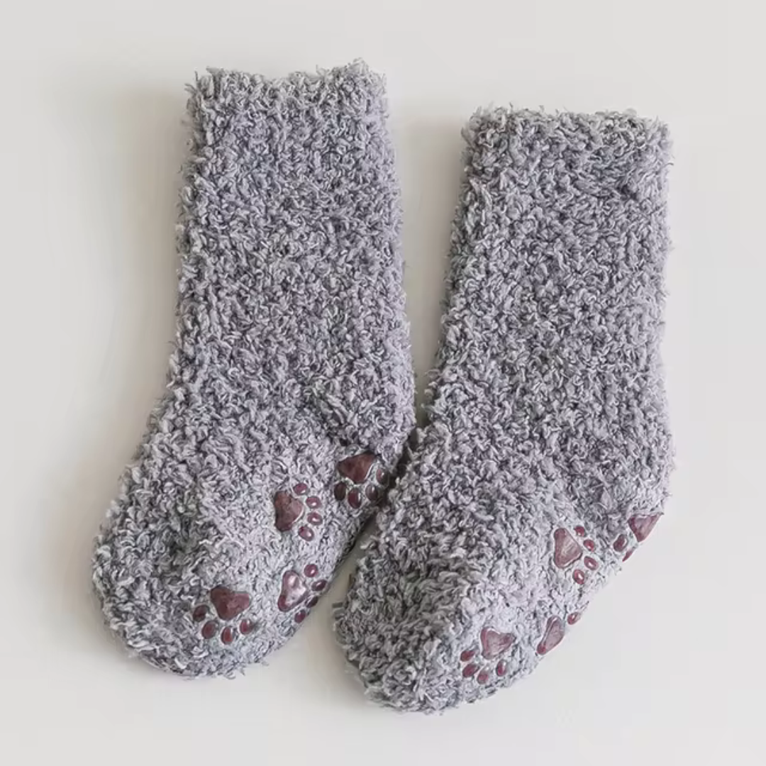 Gray fleece socks with contrasting paw-print sole details