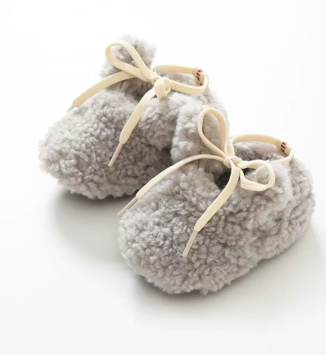 Gray plush bunny baby slippers with cream bow ties