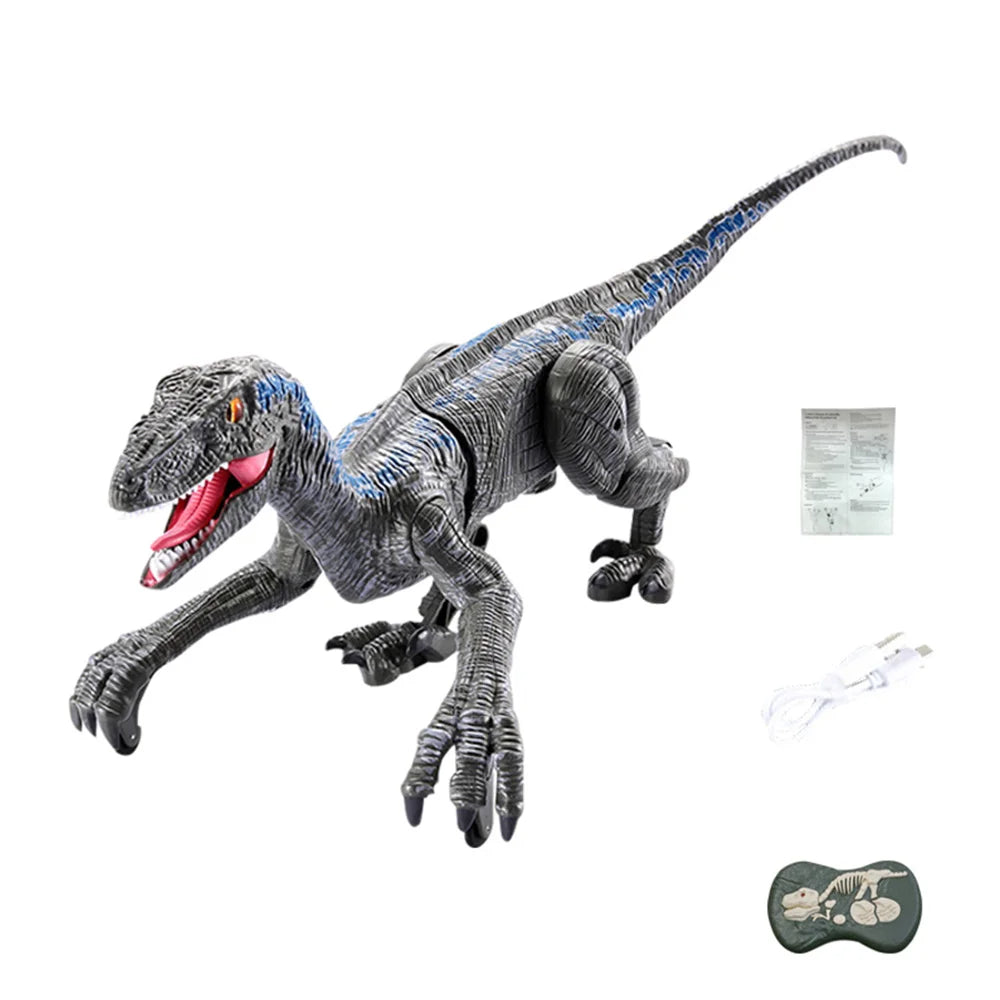 Gray Raptor remote control dinosaur with blue markings, controller, USB cable and manual