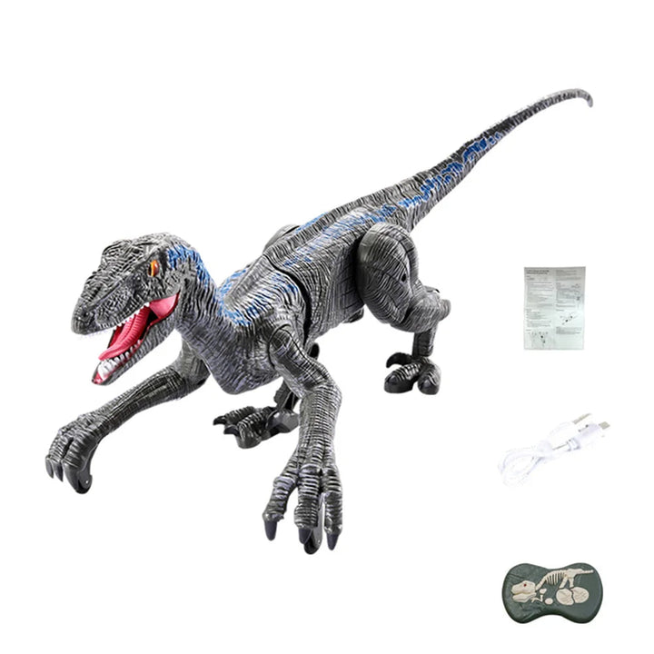 Gray Raptor remote control dinosaur with blue markings, controller, USB cable and manual