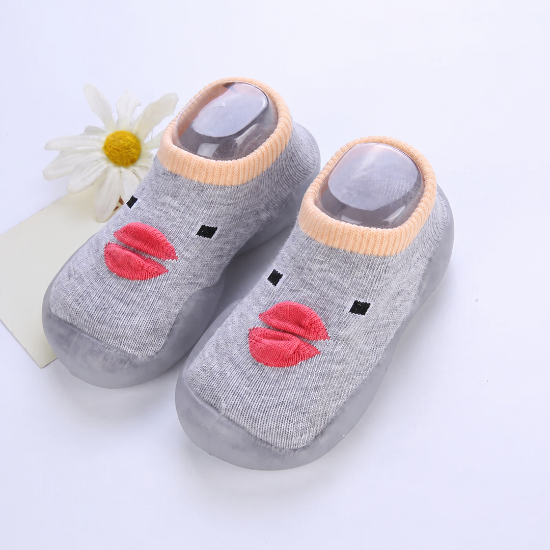 Gray sock shoes with coral duck beaks and pale peach cuffs