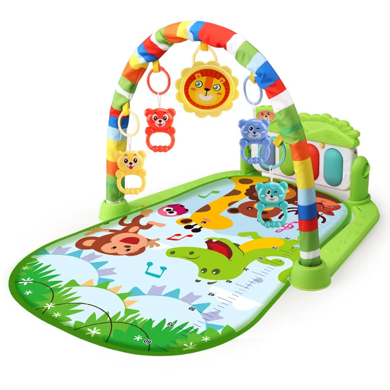 Green baby gym with a rainbow-striped arch and illustrated animal mat