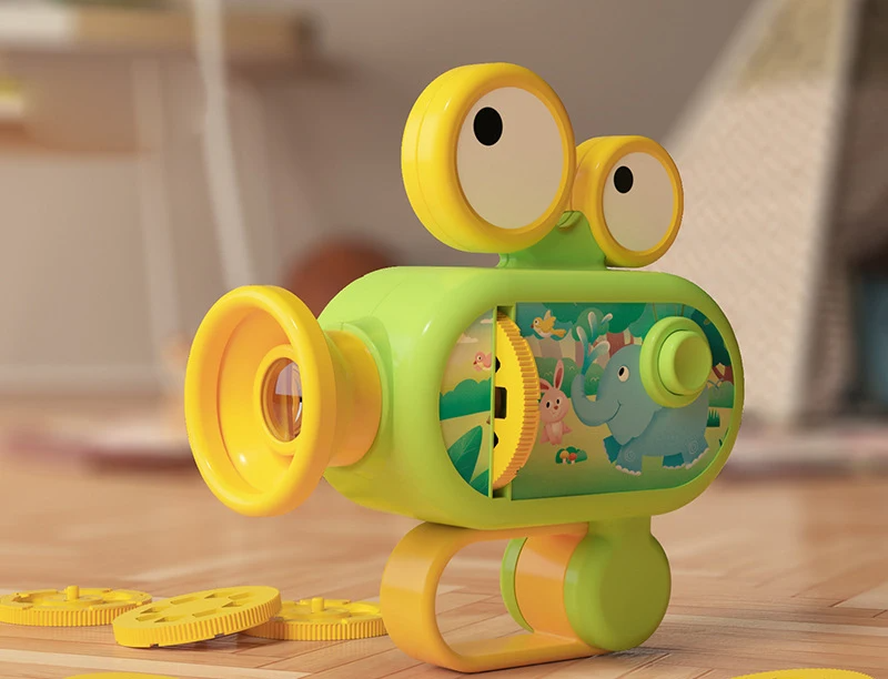 Green and yellow projector flashlight with animal artwork and picture discs
