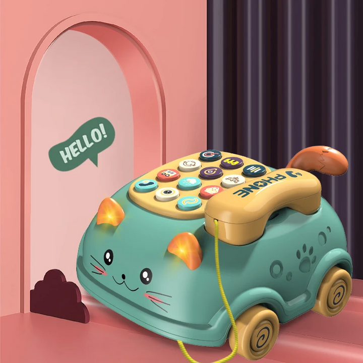 Green cat-shaped toy phone with a yellow handset, wheeled base and pull cord