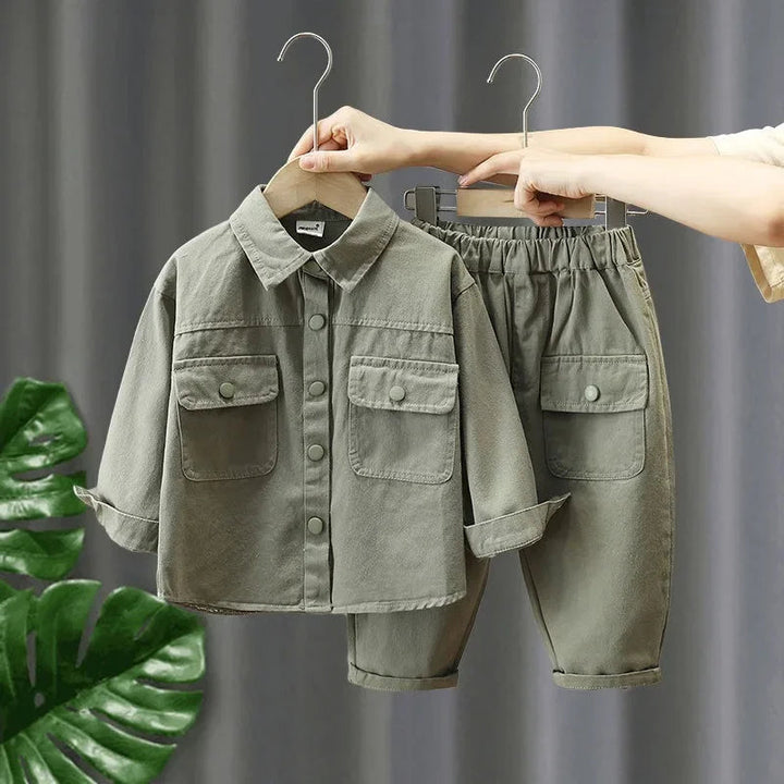 Green cotton denim shirt and pants set with flap pockets and turned-up cuffs