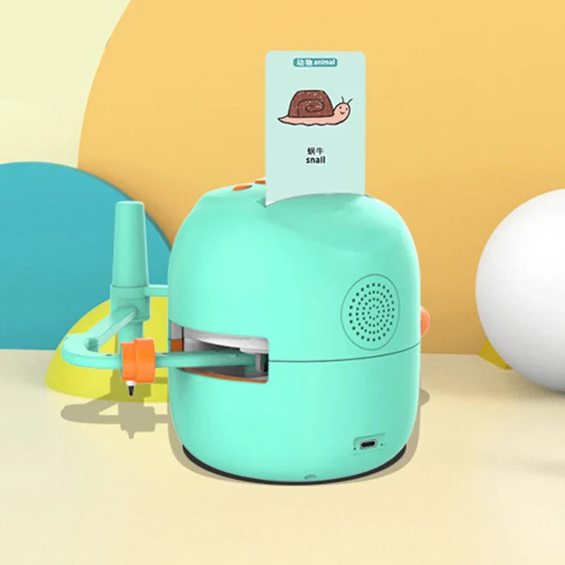 Side view of a green drawing robot with a snail card, speaker and charging port