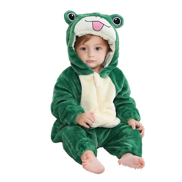Baby in a green frog romper with a cream belly and raised eyes on the hood.