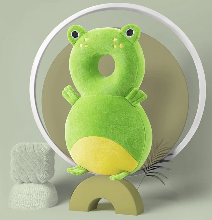 Green frog head-and-back cushion with a yellow belly and a round head opening