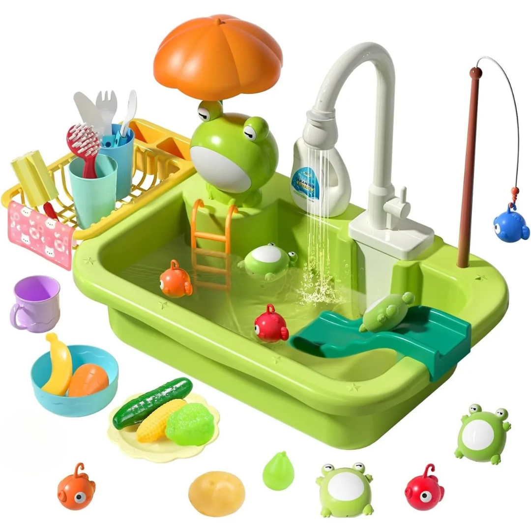 Green frog play sink with running faucet, fishing rod, toy dishes, and play food