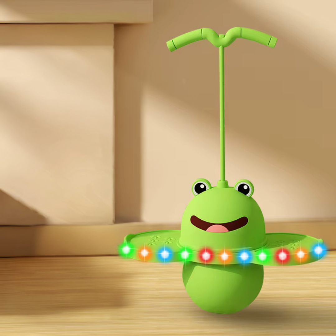 Green frog pogo stick with multicolored lights along the foot platforms.