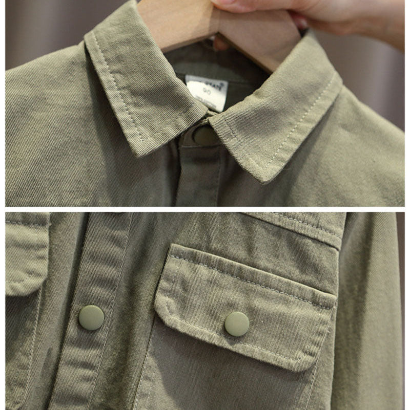 Close-up of the green jacket's pointed collar, snap buttons, and flap chest pocket