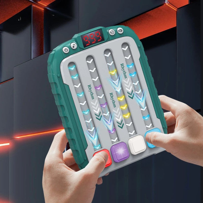 Green handheld musical reflex game held in both hands, with illuminated lanes and colored buttons