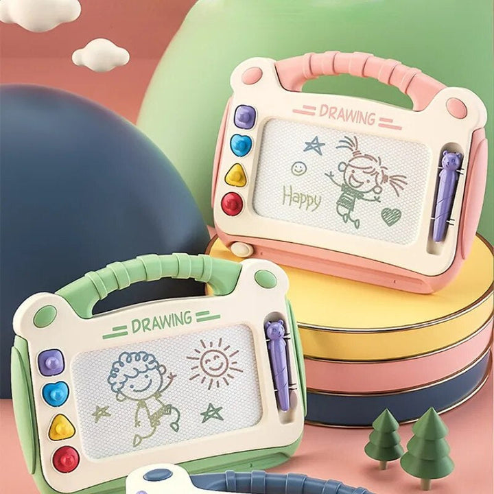 Green and pink drawing boards with carry handles, purple styluses, and sample doodles