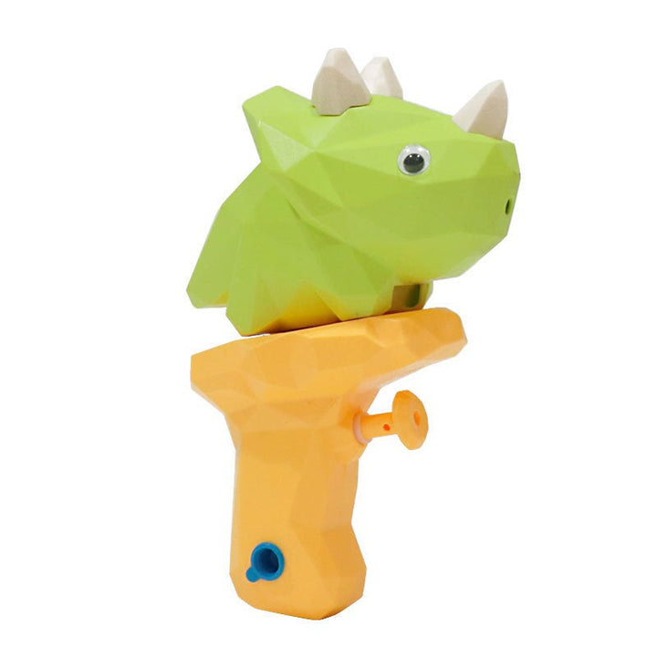 Green three-horned dinosaur water gun with a yellow handle.
