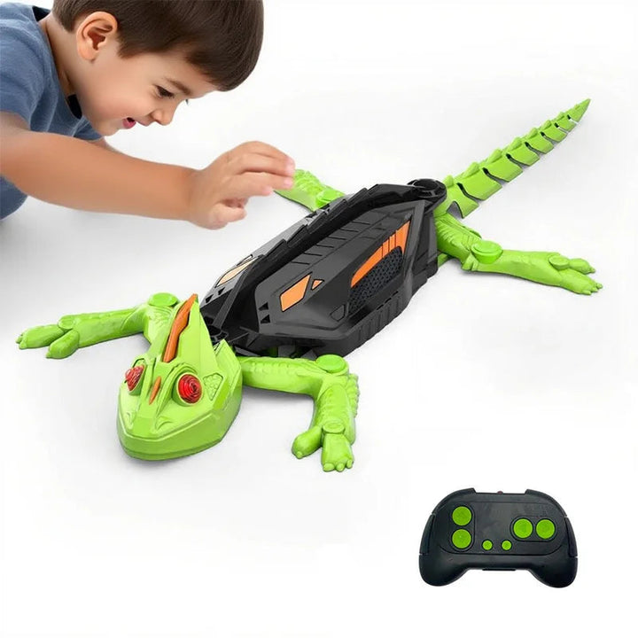Child reaching toward a green wall-climbing robot toy shown with a black remote control