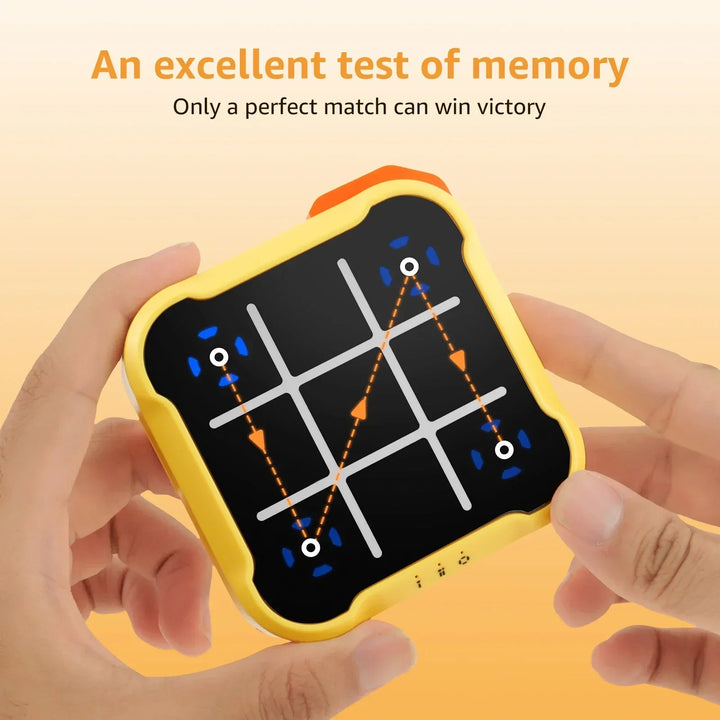 Hands holding a yellow electronic grid game with a memory-pattern diagram