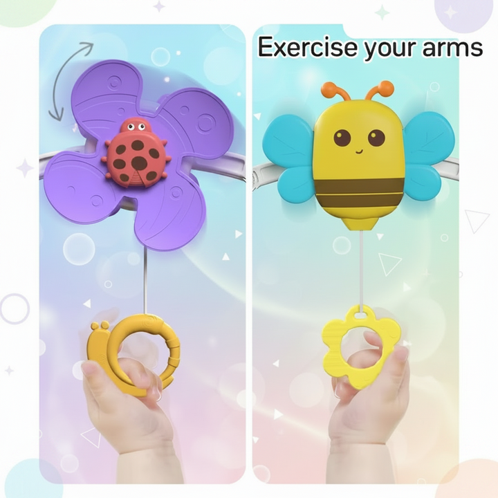 Hands pulling the hanging rings beneath the flower and bee toys