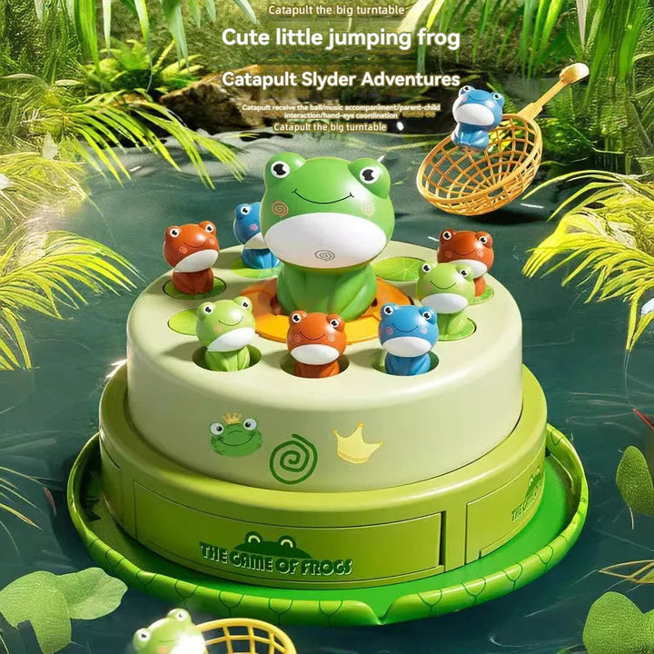 Musical frog game showing a blue frog piece in the raised catching basket