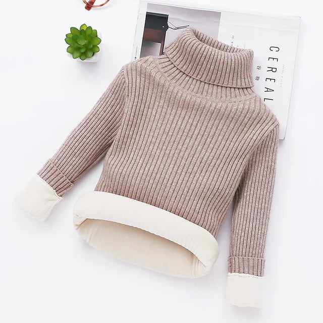 Khaki long-sleeve turtleneck sweater with cream lining at the hem and cuffs