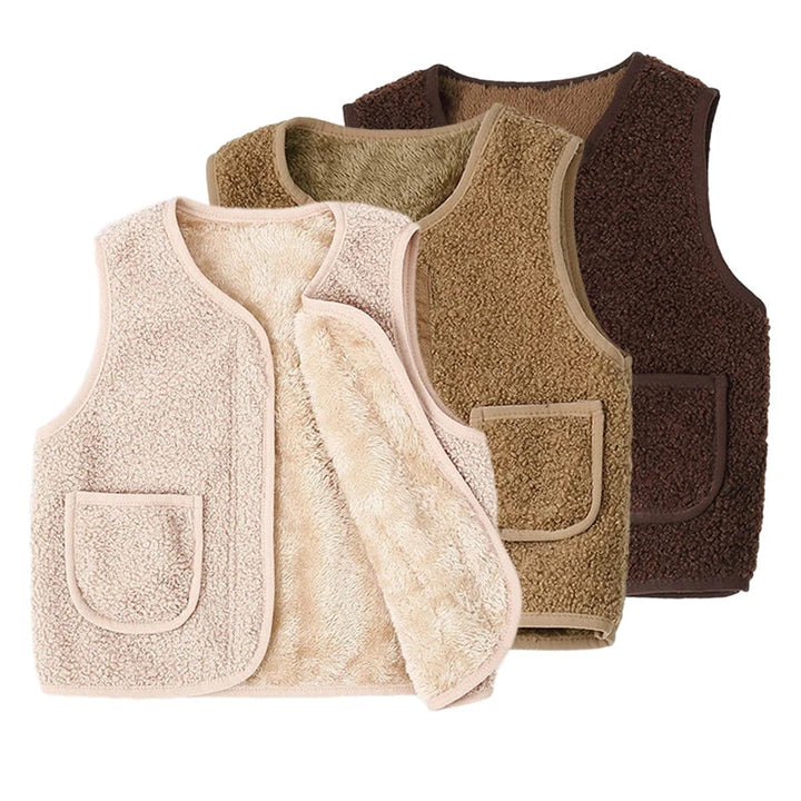 Three neutral-tone children&