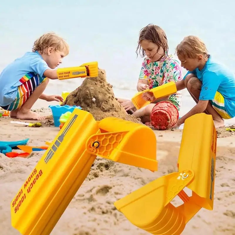 Children playing in beach sand with yellow sand grabbers shown in the foreground