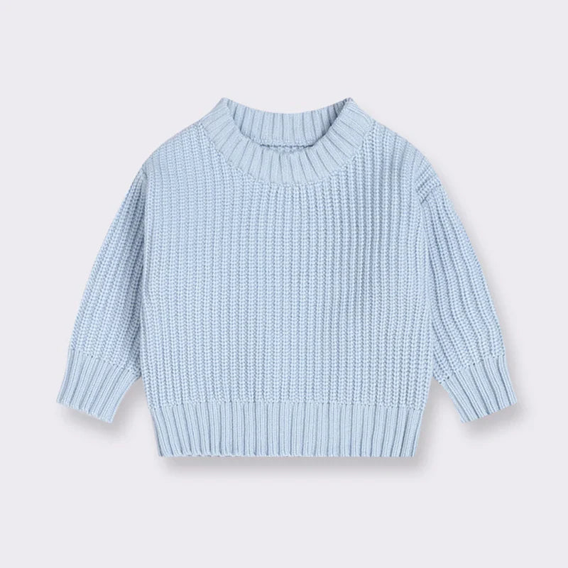 Light blue cotton knit sweater with a round neckline, long sleeves, and ribbed cuffs and hem.