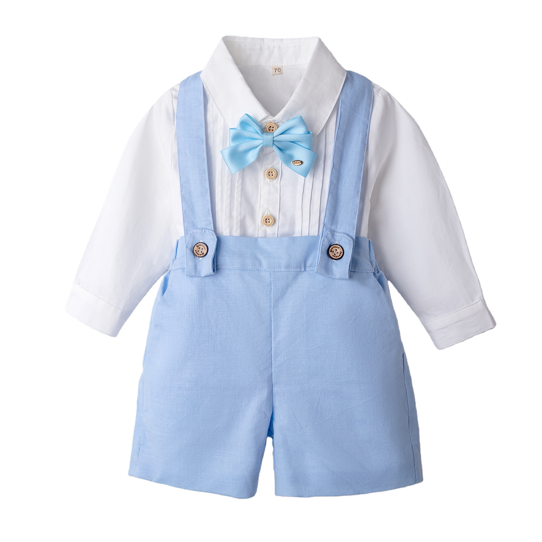 Light blue suspender shorts paired with a white long-sleeve shirt and blue bow tie