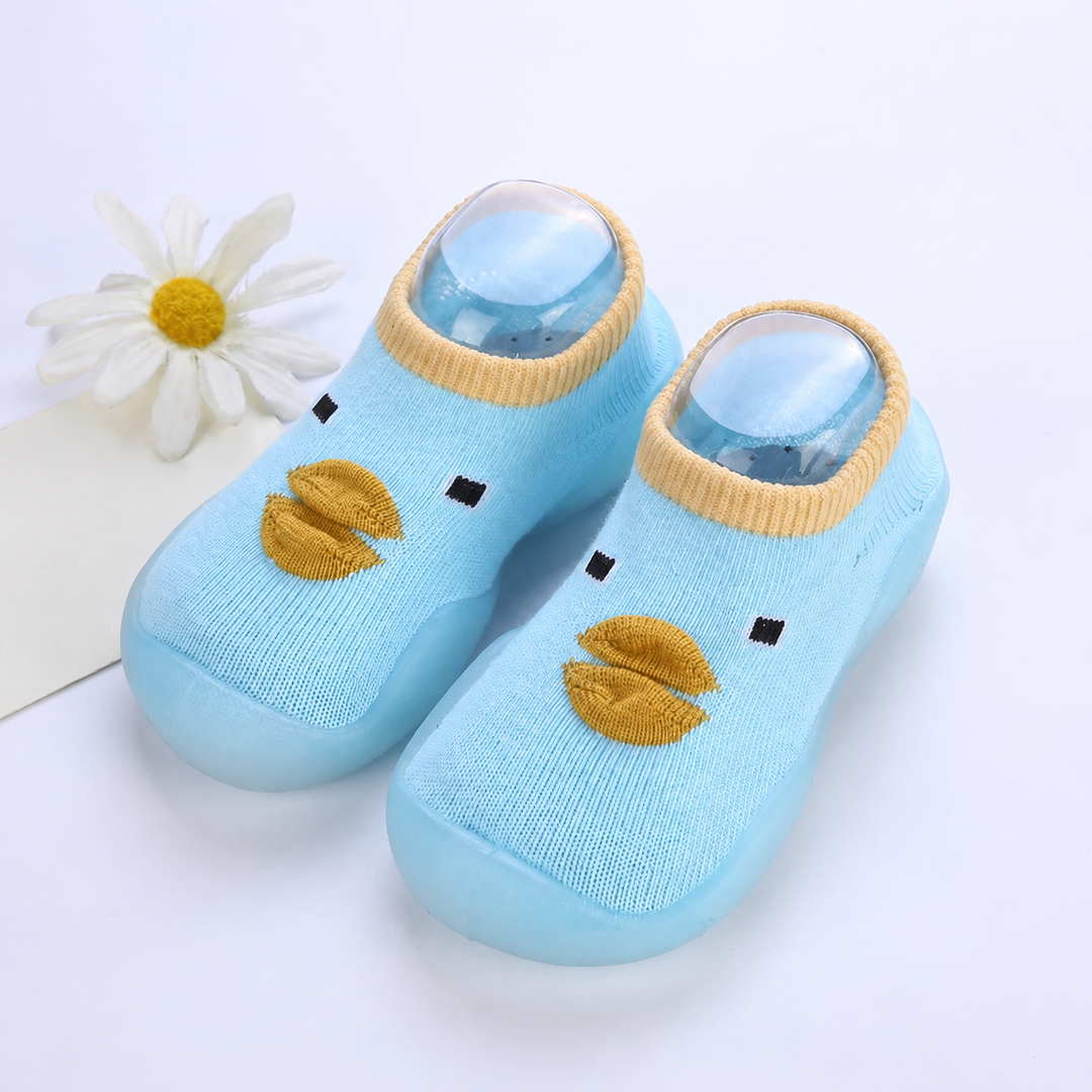 Light blue duck-face sock shoes with mustard-colored beaks and pale contrasting cuffs