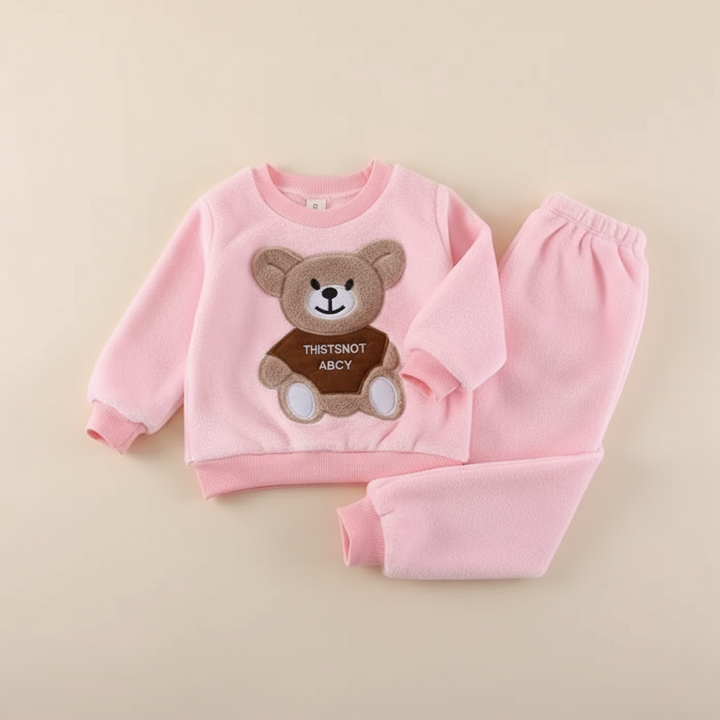 Light pink pullover and matching pants with a large teddy-bear design on the top